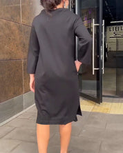 Losvallende jurk in een effen kleur in de kleur Zwart voor dames in stijl ideaal voor de herfst.