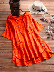 Monroe | Zomerblouse met korte mouwen en knoopjes aan de zijkant in de kleur Oranje voor dames in stijl ideaal voor de zomer.