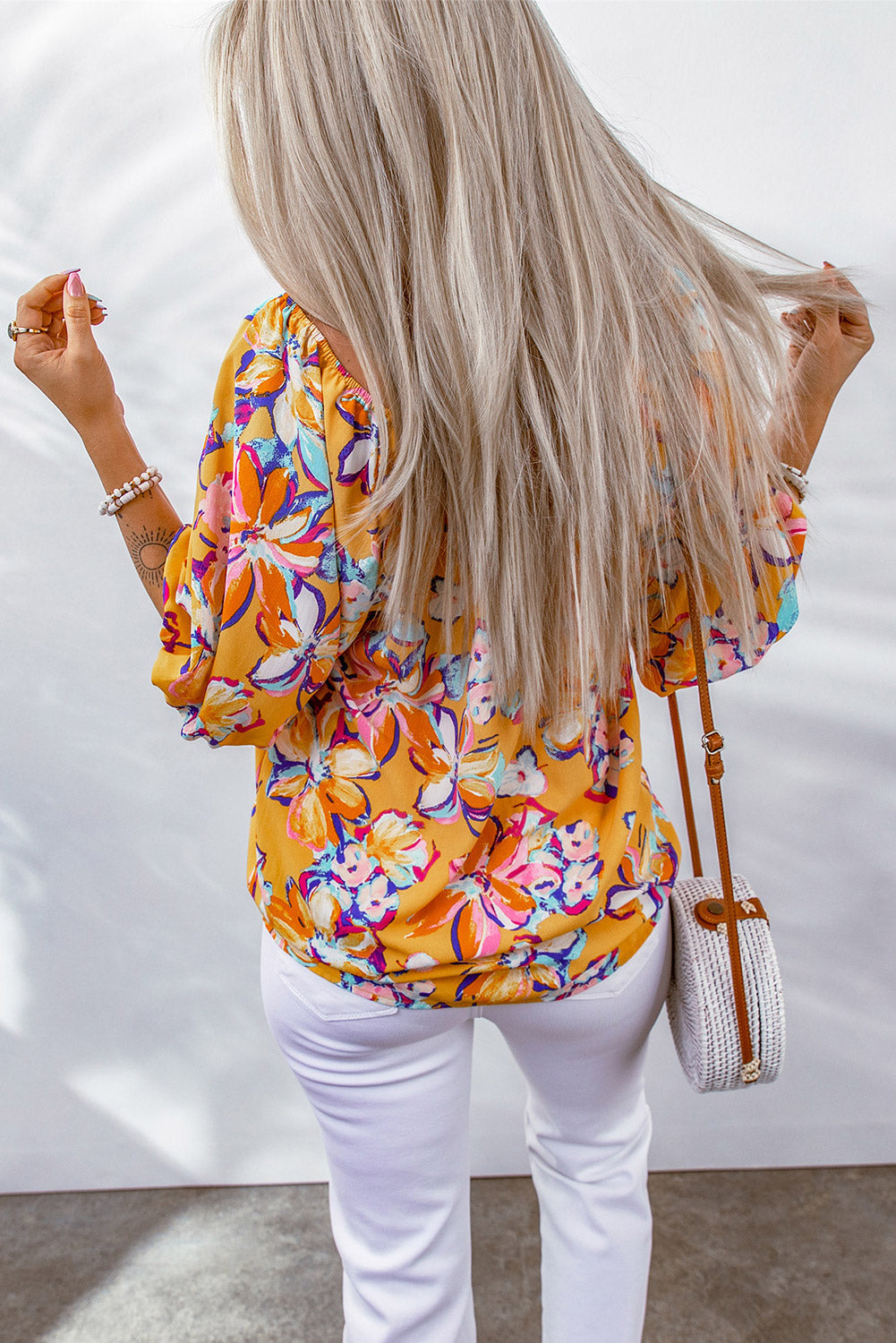 Oranje Bloemenprint Blouse met Elastische Halslijn in de kleur Oranje voor dames in stijl ideaal voor de lente.
