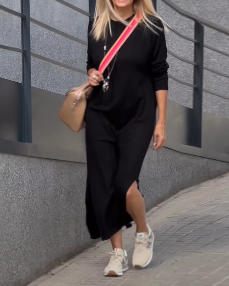 Sweaterjurk met zijsplitten en een ronde halslijn in de kleur Zwart voor dames in Casual stijl ideaal voor de herfst.