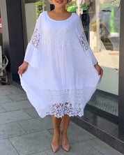 Witte zomerse jurk in de kleur Wit voor dames in stijl ideaal voor de lente.