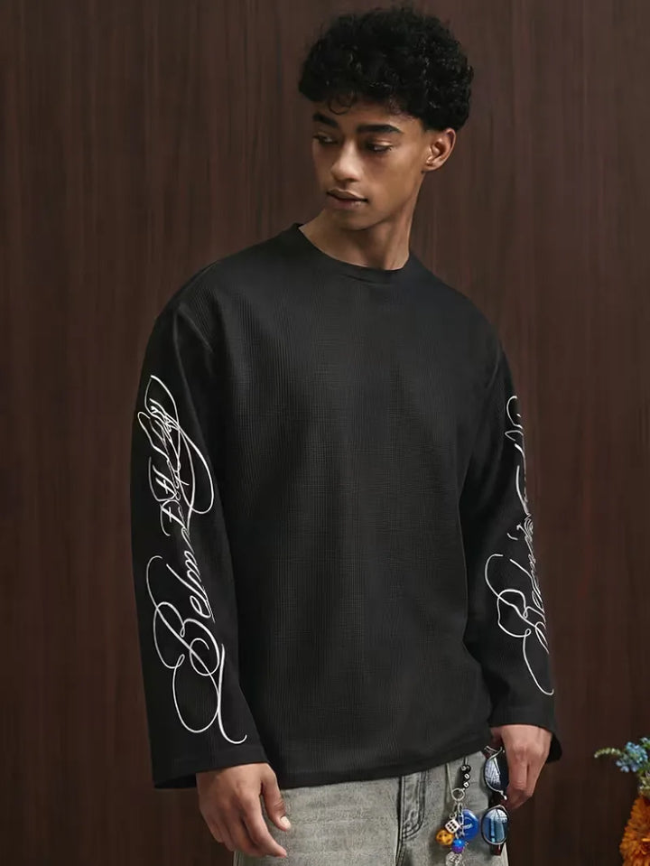 Oversized longsleeve met alfabetische print