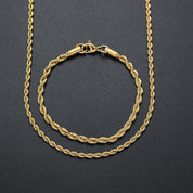 Roestvrijstalen vergulde armband en ketting set, gemaakt van hoogwaardig 316L roestvrij staal met een luxe vergulde afwerking. Geschikt voor zowel mannen als vrouwen en perfect om elke outfit te verfraaien.