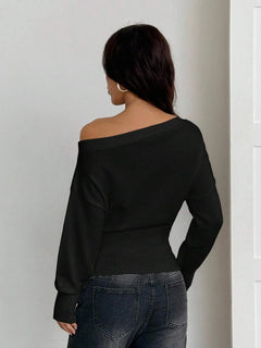 Oversized trui met asymmetrische hals