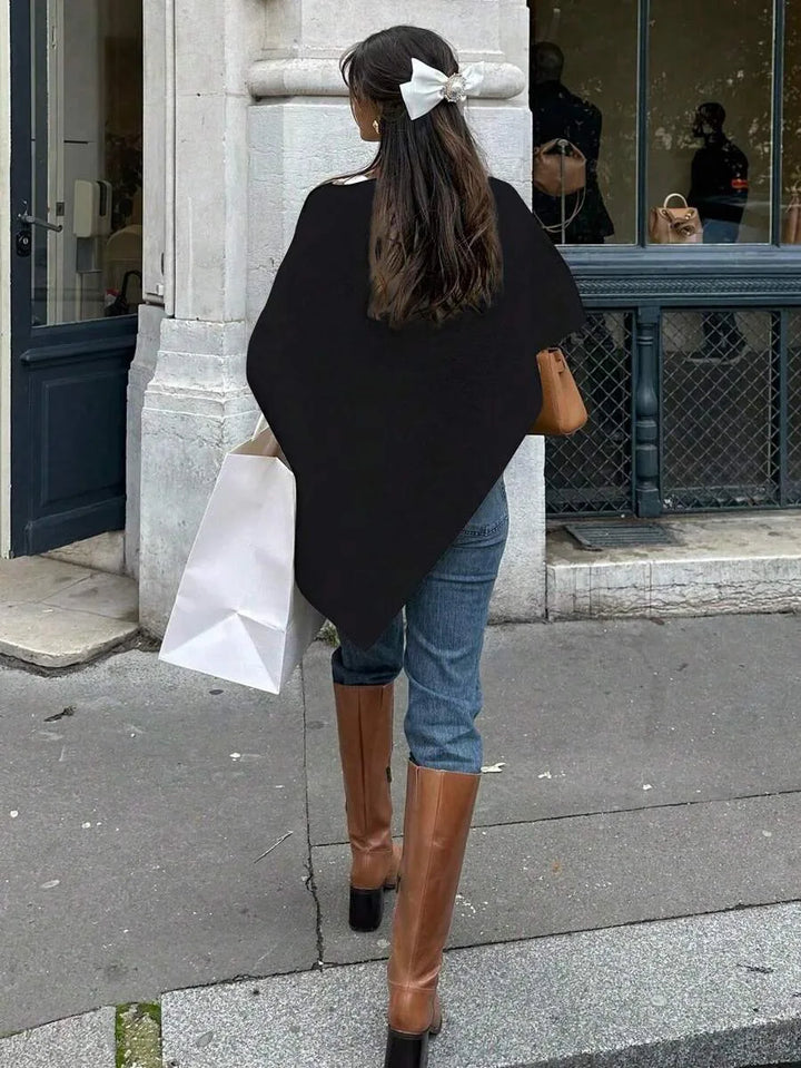 Oversized poncho met asymmetrische hals