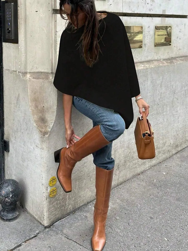 Oversized poncho met asymmetrische hals