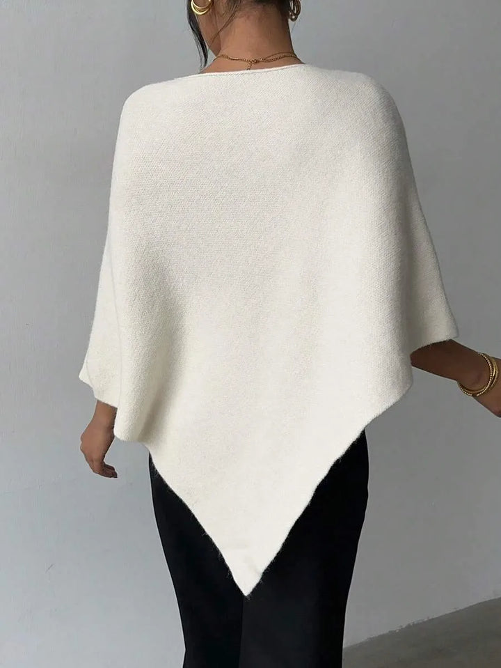 Oversized poncho met asymmetrische hals