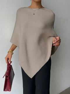 Oversized poncho met asymmetrische hals