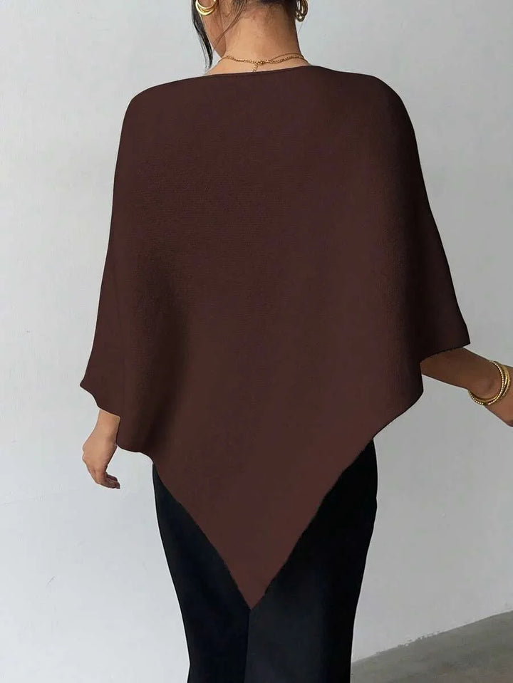 Oversized poncho met asymmetrische hals