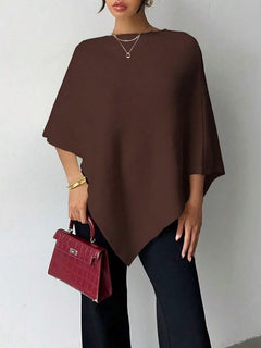 Oversized poncho met asymmetrische hals