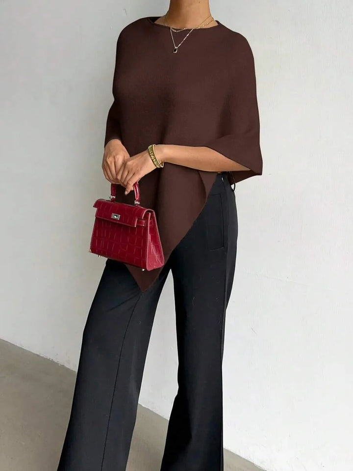 Oversized poncho met asymmetrische hals