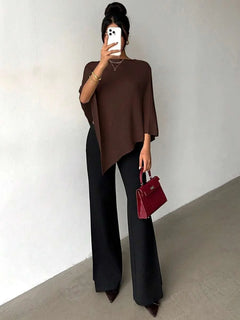 Oversized poncho met asymmetrische hals