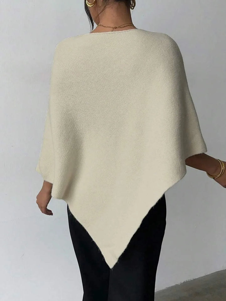 Oversized poncho met asymmetrische hals