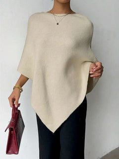Oversized poncho met asymmetrische hals