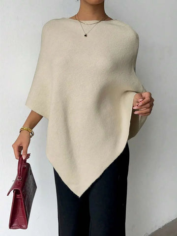 Oversized poncho met asymmetrische hals