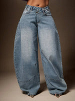 Wijde denim broek met asymmetrische taille