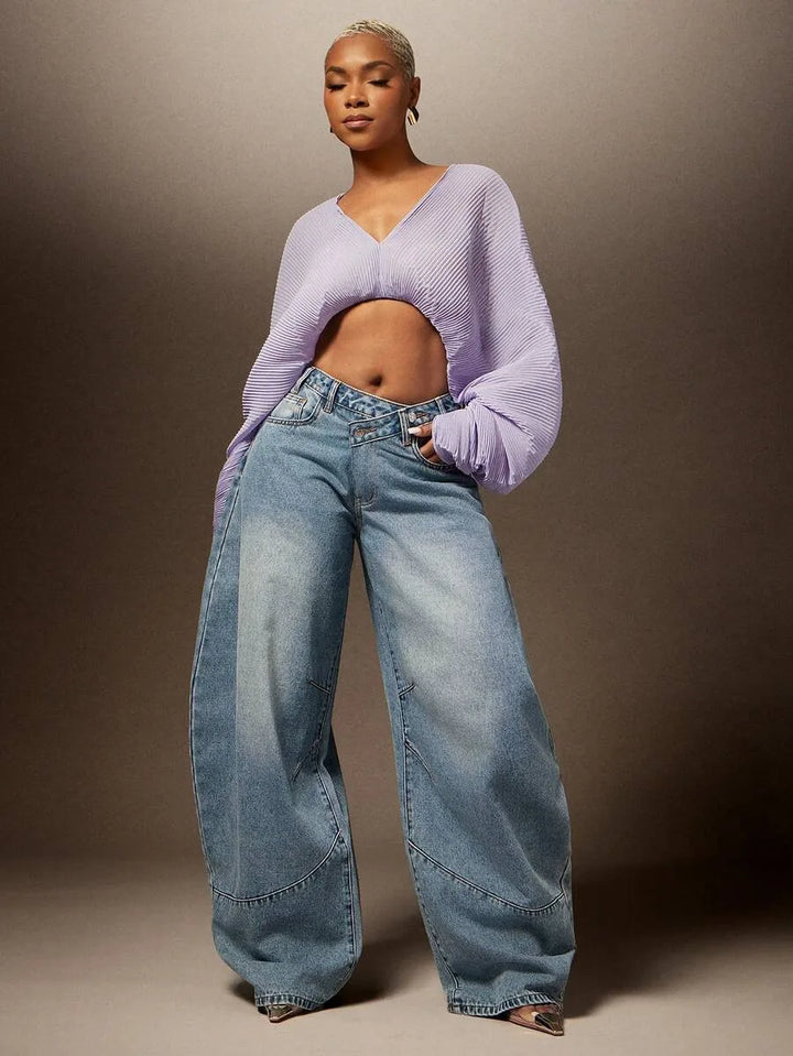 Wijde denim broek met asymmetrische taille