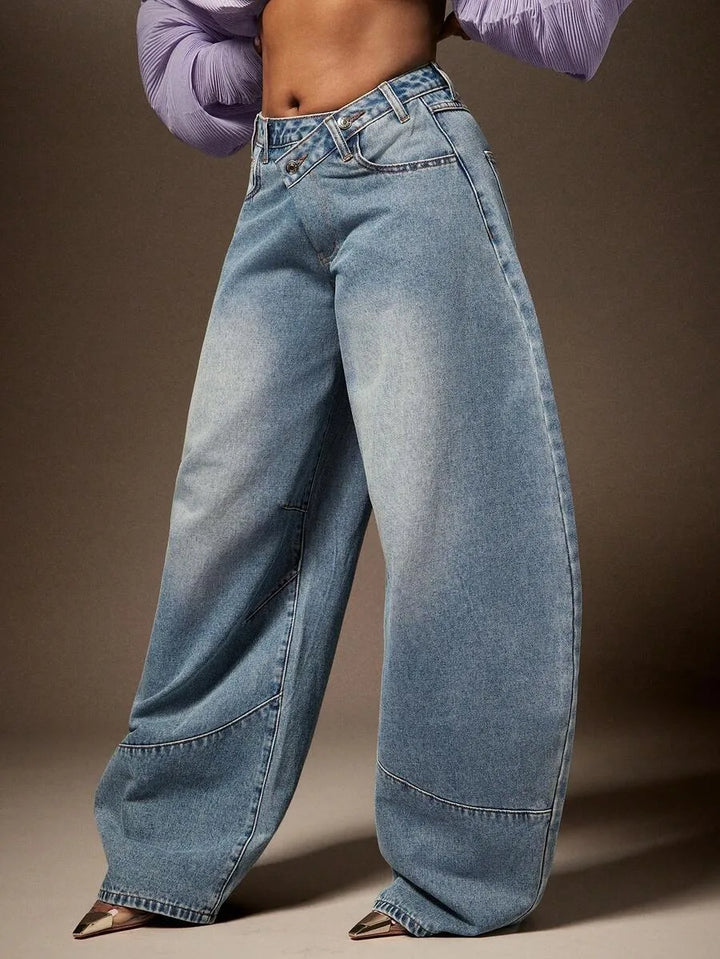 Wijde denim broek met asymmetrische taille