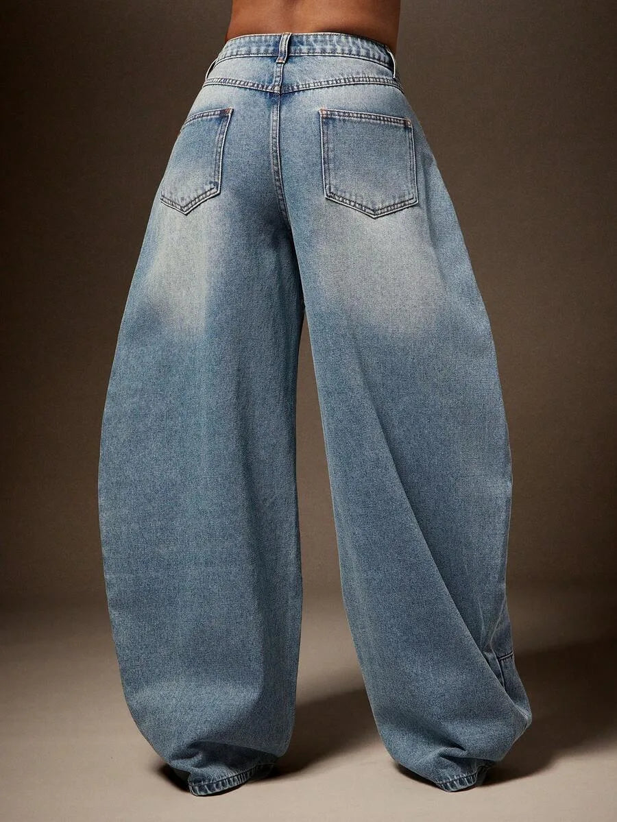 Wijde denim broek met asymmetrische taille