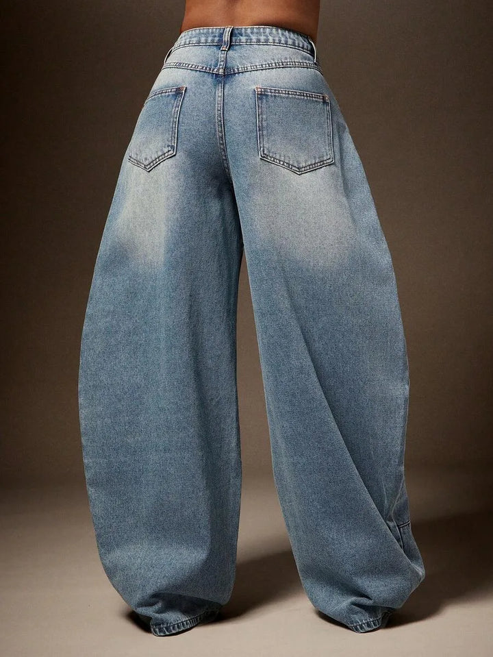 Wijde denim broek met asymmetrische taille