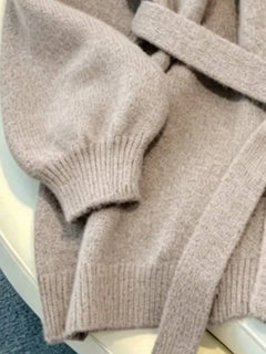 Oversized cardigan met riem