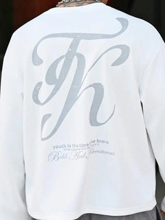 Oversized longsleeve met graphic slogan