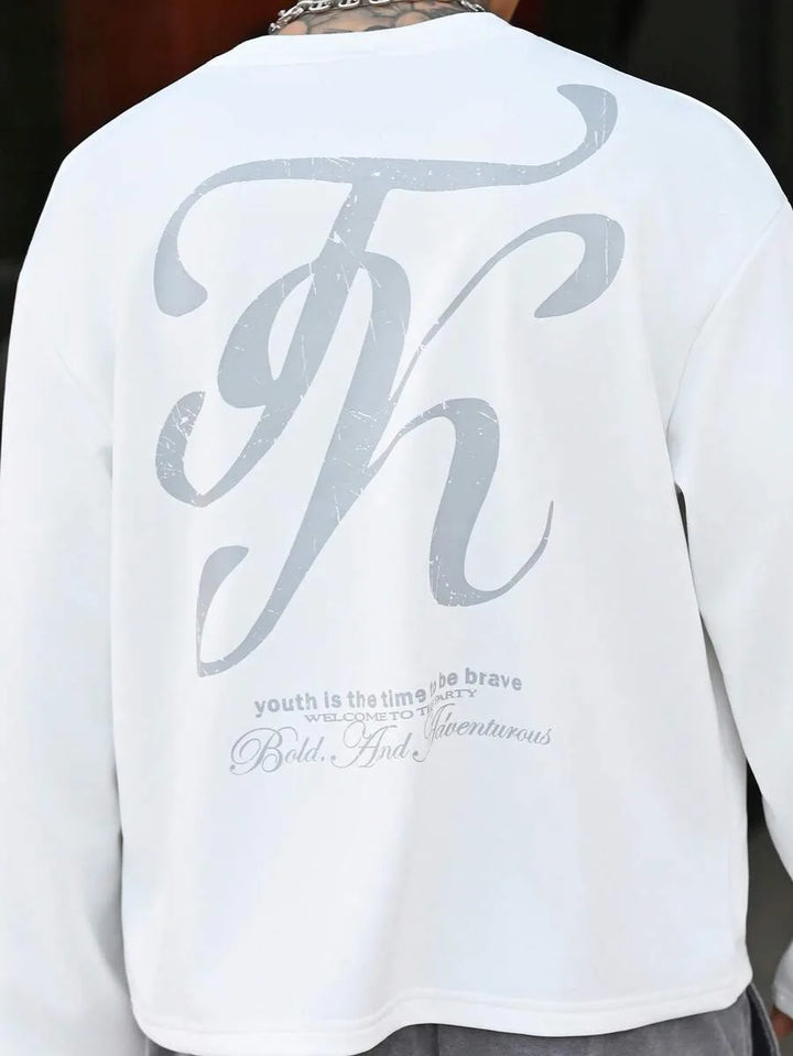 Oversized longsleeve met graphic slogan