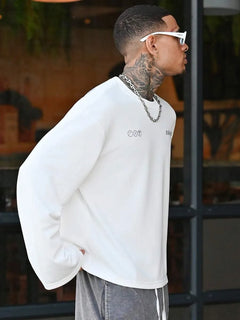 Oversized longsleeve met graphic slogan