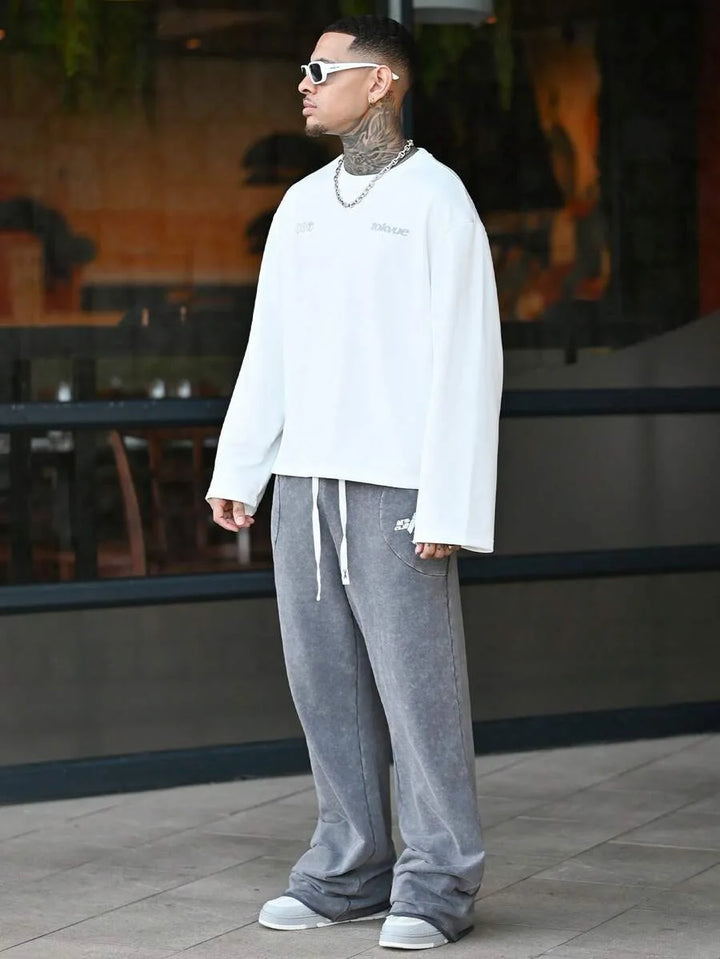 Oversized longsleeve met graphic slogan