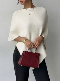 Oversized poncho met asymmetrische hals