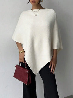 Oversized poncho met asymmetrische hals