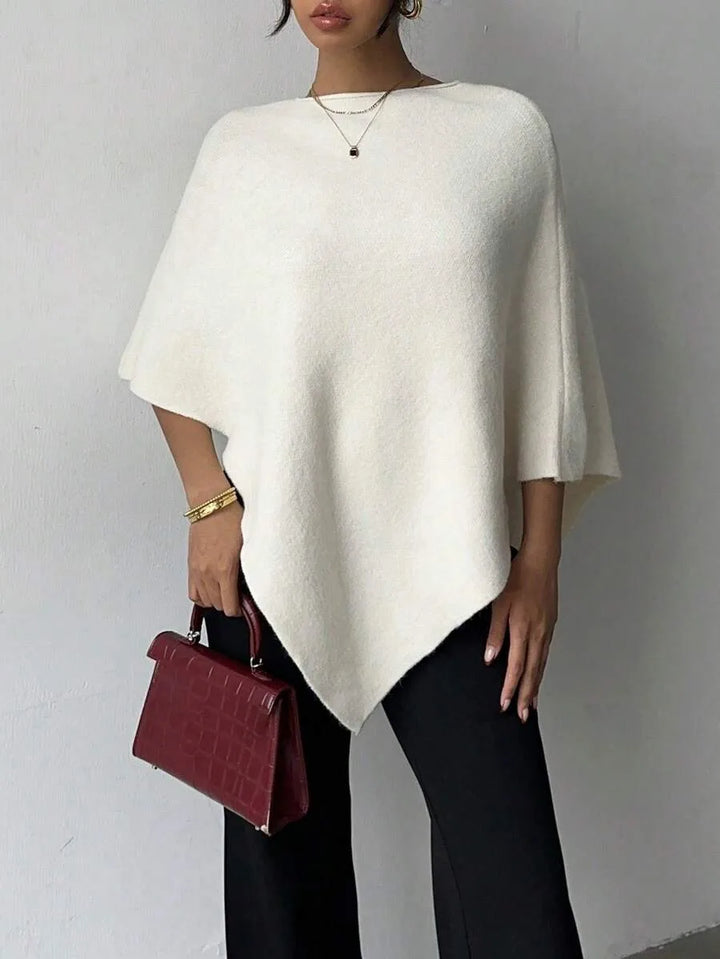 Oversized poncho met asymmetrische hals