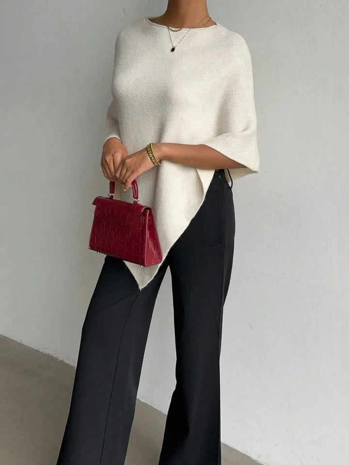 Oversized poncho met asymmetrische hals