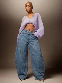 Wijde denim broek met asymmetrische taille