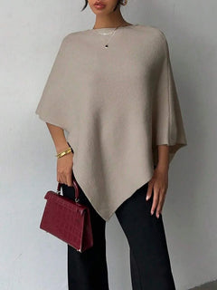 Oversized poncho met asymmetrische hals