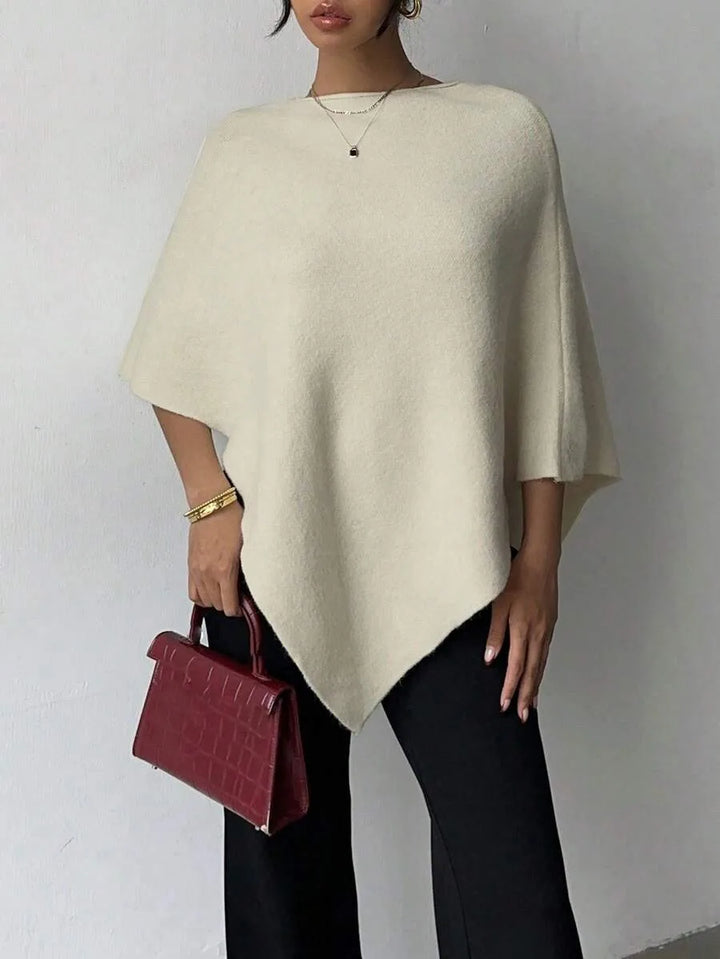 Oversized poncho met asymmetrische hals