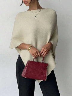 Oversized poncho met asymmetrische hals