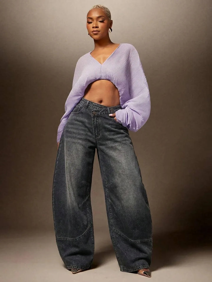 Wijde denim broek met asymmetrische taille