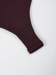 Bodysuit met diepe V-hals