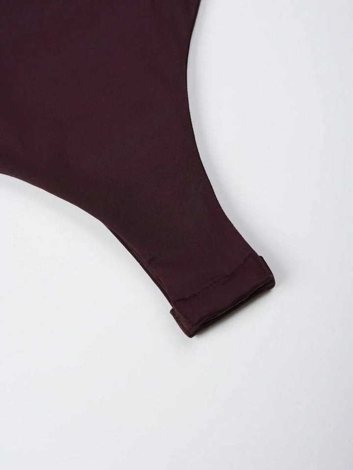 Bodysuit met diepe V-hals