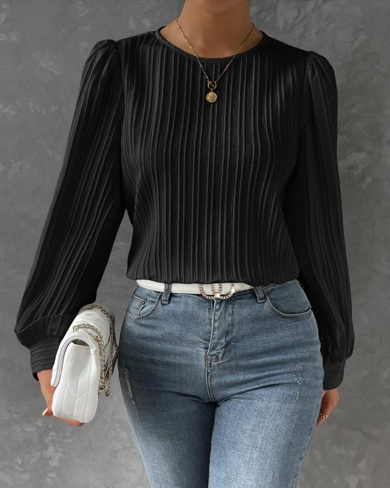 Deze stijlvolle blouse is voorzien van lantaarnmouwen voor een trendy uitstraling. Gemaakt van een katoenmix, spandex en polyester, is deze blouse geschikt voor diverse gelegenheden en biedt het een comfortabele pasvorm.