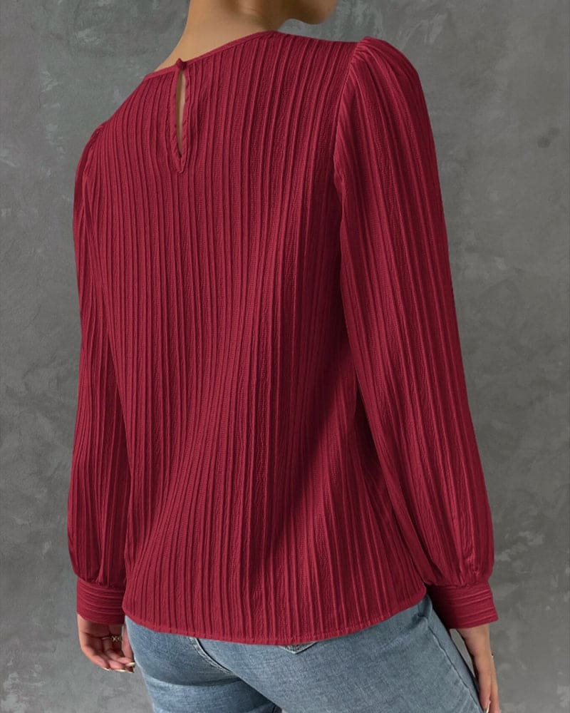 Deze stijlvolle blouse is voorzien van lantaarnmouwen voor een trendy uitstraling. Gemaakt van een katoenmix, spandex en polyester, is deze blouse geschikt voor diverse gelegenheden en biedt het een comfortabele pasvorm.