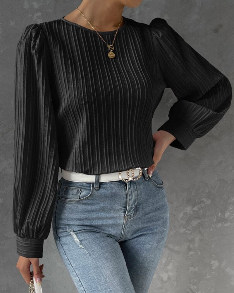 Deze stijlvolle blouse is voorzien van lantaarnmouwen voor een trendy uitstraling. Gemaakt van een katoenmix, spandex en polyester, is deze blouse geschikt voor diverse gelegenheden en biedt het een comfortabele pasvorm.