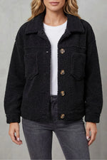 Fleece jas met knopen en zakken