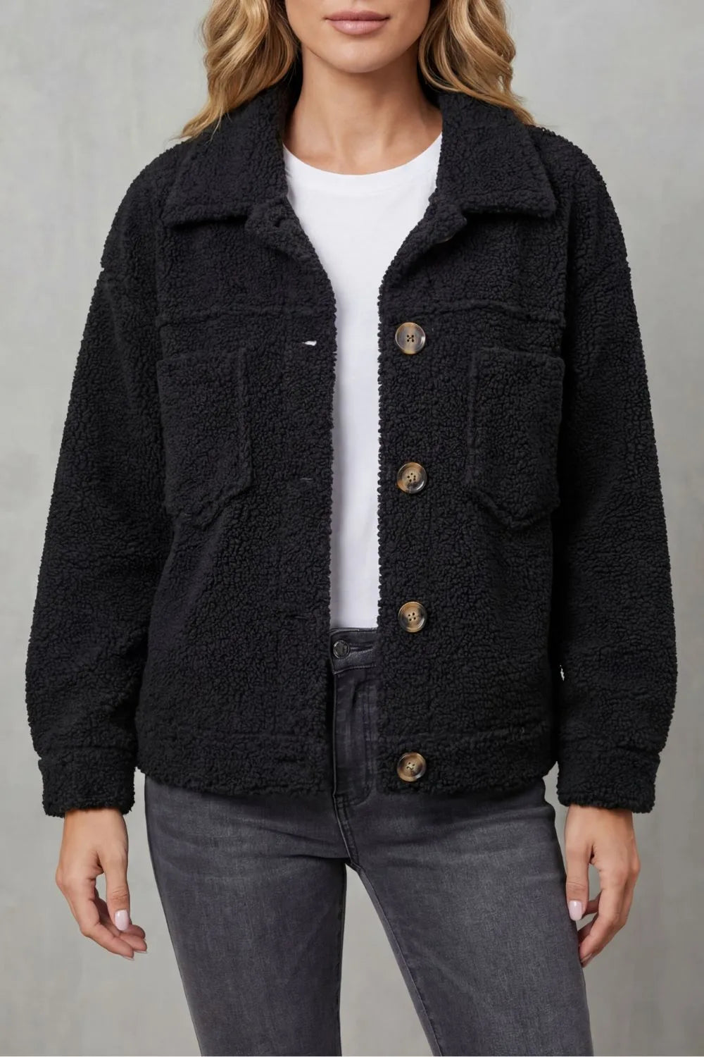 Fleece jas met knopen en zakken