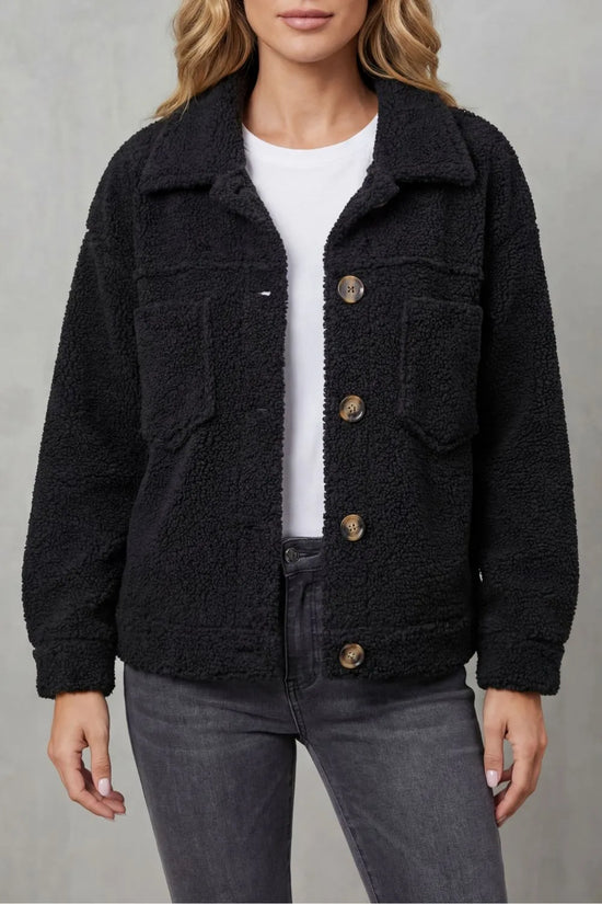 Fleece jas met knopen en zakken