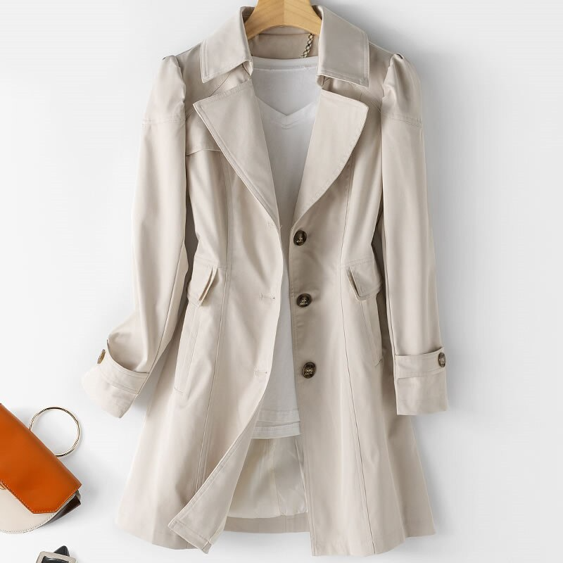 Trendy trenchcoat voor dames - ideaal voor een moderne en stijlvolle look tijdens het herfstseizoen. Gemaakt van hoogwaardige stof voor duurzaamheid en comfort, met praktische zakken en verfijnde details.