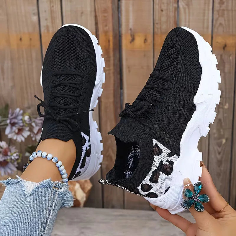 Lage sneaker met leopard print