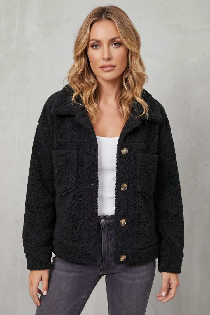 Fleece jas met knopen en zakken