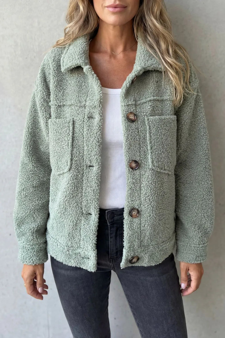 Fleece jas met knopen en zakken